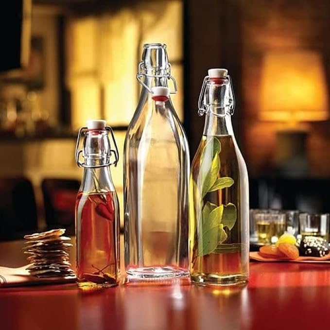 Bormioli Rocco Swing Top Glass Bottle (Set of 4) - 8.5 oz Reusable Container with Secure Metal Clasp, Ideal for Homemade Juices, Oil Infusions, Condiments, Mixers - Everyday Drinking Glasses