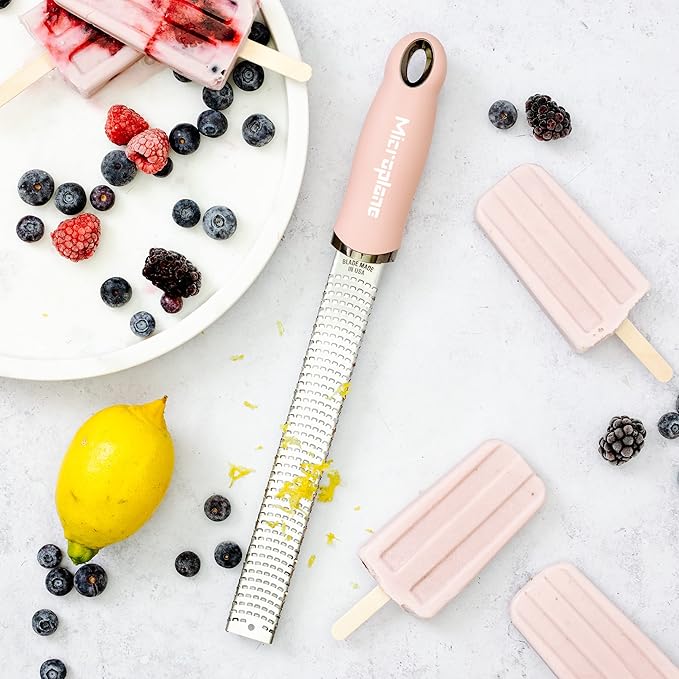 Microplane Zester Grater in Dusty Rose for Citrus Fruits, Hard Cheese, Ginger, Chocolate and Nutmeg with Fine Stainless Steel Blade - Made in USA