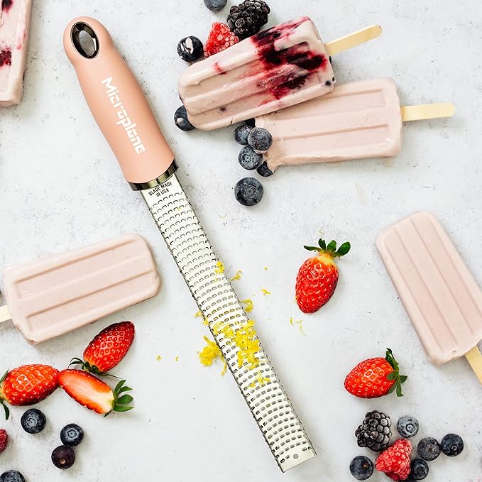 Microplane Zester Grater in Dusty Rose for Citrus Fruits, Hard Cheese, Ginger, Chocolate and Nutmeg with Fine Stainless Steel Blade - Made in USA