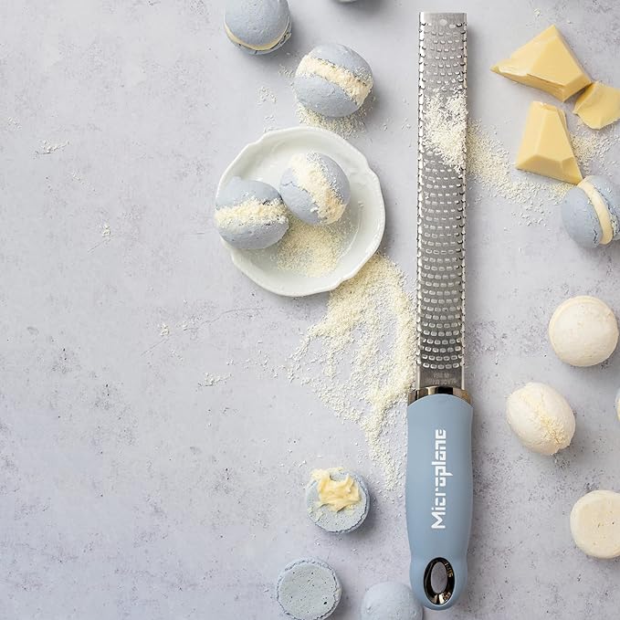 Microplane Zester Grater in Sky Blue for Citrus Fruits, Hard Cheese, Ginger, Chocolate and Nutmeg with Fine Stainless Steel Blade - Made in USA