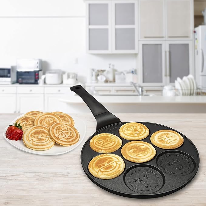 Emoji Mini Pancake Pan- 7 Unique Flapjack Smiley Faces for Kids, Nonstick Pan Cake Maker Stovetop Griddle for Easy Cleanup, Long Handle for Easy Holding, Breakfast Gift- Officially Licensed by Emoji
