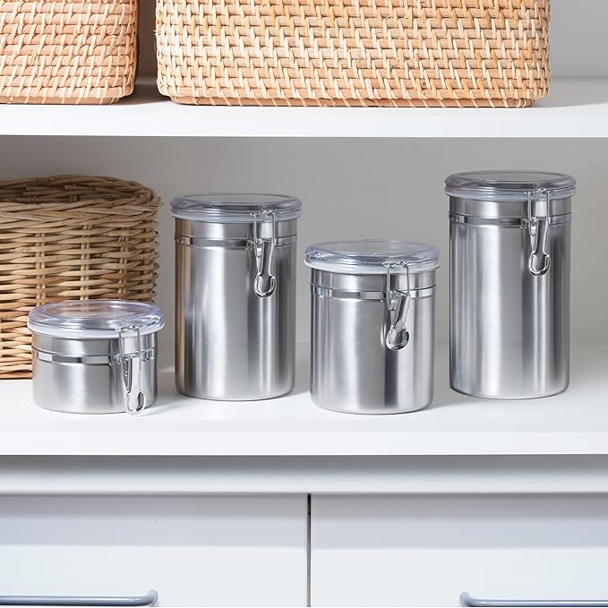 Oggi Set of 4 Stainless Steel Kitchen Canisters - Airtight Clamp Lid, Clear See-Thru Top - Ideal for Kitchen Storage, Food Storage, Pantry Storage - Includes 1 each: 26oz, 36oz, 47oz, 62oz.
