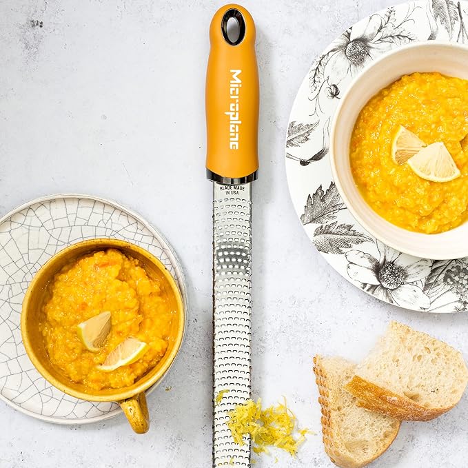 Microplane Premium Zester Grater in Mustard | Lemon Zester tool, Hard Cheese & Vegetable Grater | For Citrus, Parmesan Cheese, Garlic, Ginger, Nutmeg | Fine Stainless Steel Blade, Made in USA